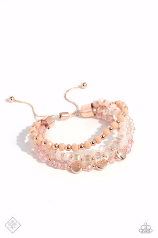 DEWY DELIGHT - ROSE GOLD AND WHITE STONE BEAD SLIDE BRACELET - PAPARAZZI JUNE 2023