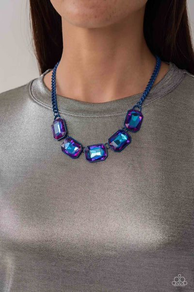 EMERALD CITY COUTURE - BLUE CHAIN PURPLE UV SHIMMER GEM SHORT NECKLACE - PAPARAZZI - LIFE OF THE PARTY JUNE 2023