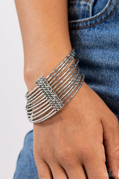 SHIMMERY SILHOUETTE - SILVER TEXTURED BANGLE HEMATITE RHINESTONE BRACELET - PAPARAZZI