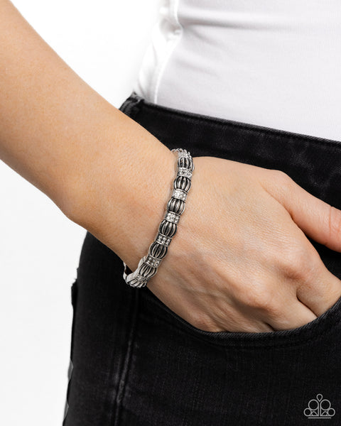 METRO REVERIE - WHITE RHINESTONE SILVER STRETCHY BRACELET - PAPARAZZI