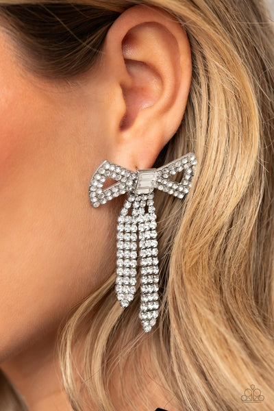 JUST BOW WITH IT - WHITE RHINESTONE SILVER BOW POST EARRINGS - PAPARAZZI - LIFE OF THE PARTY AUGUST 2023