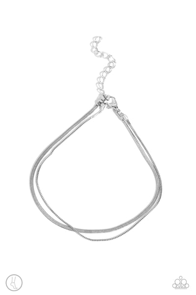 GLISTENING GAUGE - SILVER SNAKE CHAIN LAYERED ANKLET - PAPARAZZI