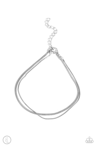GLISTENING GAUGE - SILVER SNAKE CHAIN LAYERED ANKLET - PAPARAZZI