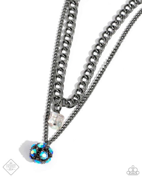 FLAIR FOR THE FIERCE - BLUE IRIDESCENT RHINESTONE GUNMETAL LAYERED SHORT NECKLACE - PAPARAZZI - FASHION FIX JUNE 2024