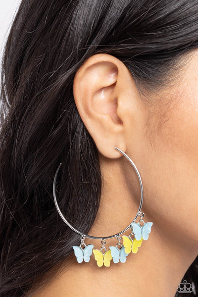 BEMUSING BUTTERFLIES - BLUE AND YELLOW BUTTERFLY SILVER HOOP EARRINGS - PAPARAZZI