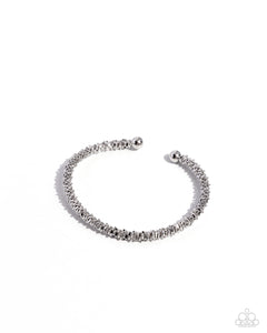 TWISTED TRENCHANT - SILVER FLEXI CUFF BRACELET - PAPARAZZI