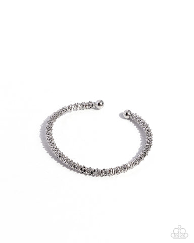 TWISTED TRENCHANT - SILVER FLEXI CUFF BRACELET - PAPARAZZI
