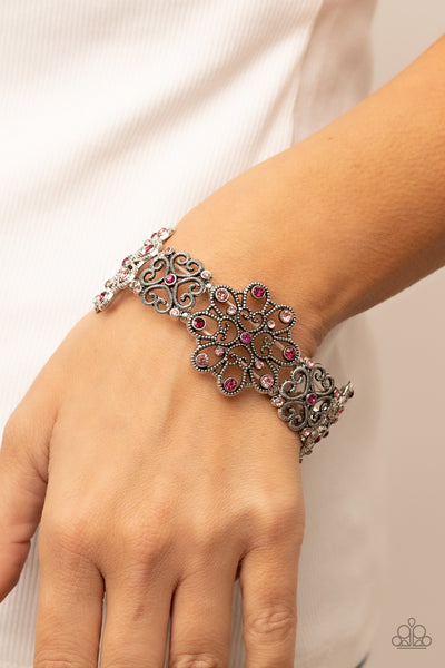 REGAL RECOGNITION - PINK RHINESTONE SILVER FILIGREE STRETCHY BRACELET - PAPARAZZI