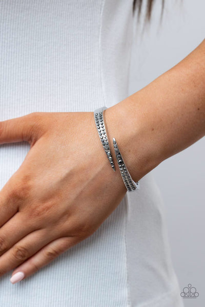 SIDESWIPING SHIMMER - SILVER HEMATITE RHINESTONE HINGED BRACELET - PAPARAZZI