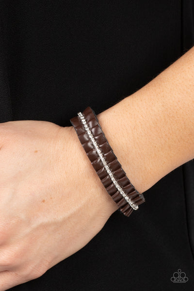PRETTY, PRETTY PLEATS - BROWN LEATHER WHITE RHINESTONE SLIDE BRACELET - PAPARAZZI