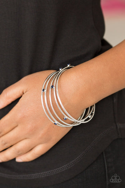 DELICATE DECADENCE - BLUE  RHINESTONE SILVER BANGLE BRACELET - PAPARAZZI