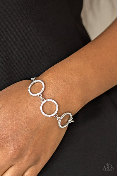 DRESS THE PART - WHITE RHINESTONE SILVER CIRCLE BRACELET - PAPARAZZ