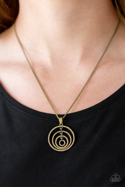 UPPER EAST SIDE - BRASS CIRCULAR FRAME TOPAZ RHINESTONE PENDANT NECKLACE - PAPARAZZI