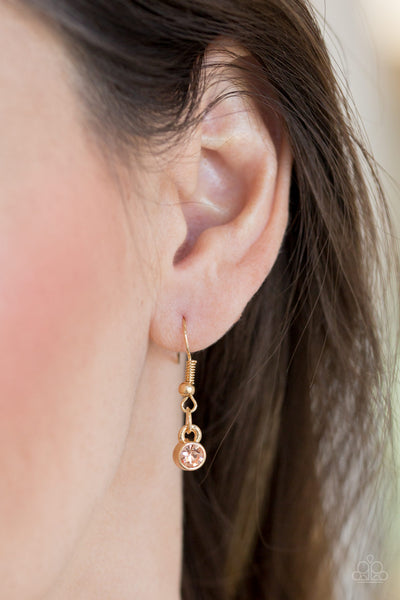 TIMELESS TRIO - GOLD CIRCLE PEACH RHINESTONE NECKLACE - PAPARAZZI