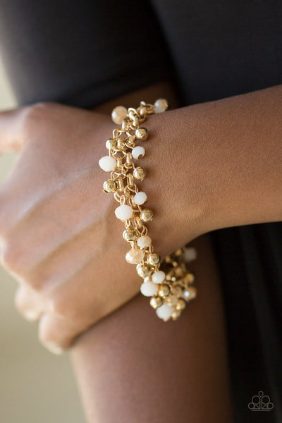 JUST FOR THE FUND OF IT! - GOLD AND WHITE BEAD BRACELET - PAPARAZZI