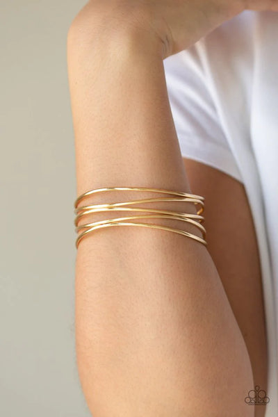SHOWSTOPPING SHEEN - GOLD BANGLE BRACELET - PAPARAZZI