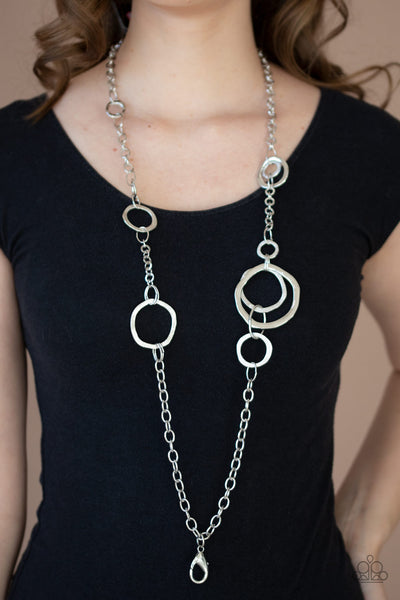 AMPED UP METALLICS - SILVER CIRCLE LANYARD NECKLACE - PAPARAZZI