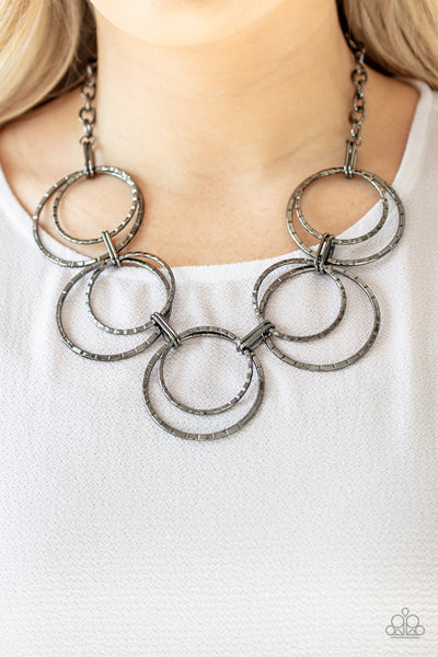 RADIANT REVOLUTION - BLACK GUNMETAL CIRCLE NECKLACE - PAPARAZZI