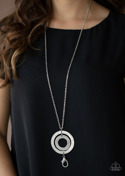 CIRCLE BACK TO THAT - SILVER HAMMERED CIRCLE LANYARD NECKLACE - PAPARAZZI