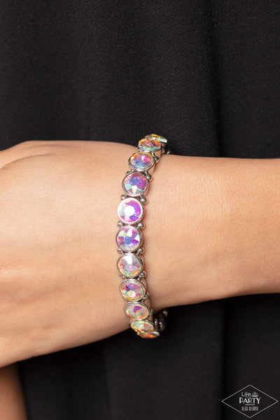 SUGAR-COATED SPARKLE - MULTI IRIDESCENT RHINESTONE SILVER STRETCHY BRACELET - PAPARAZZI