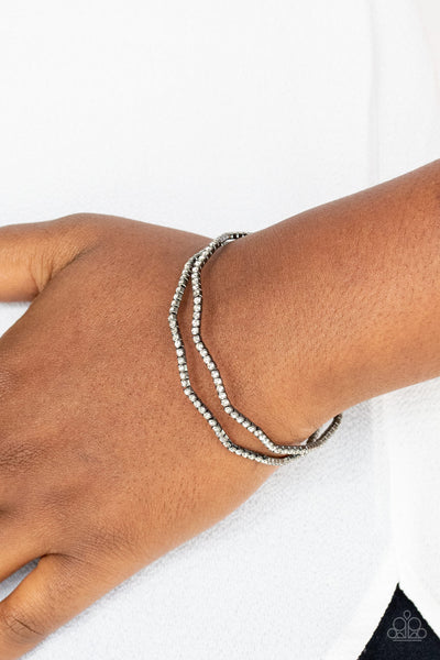 DELICATE DAZZLE - BLACK GUNMETAL RHINESTONE STRETCHY COIL CUFF BRACELET - PAPARAZZI