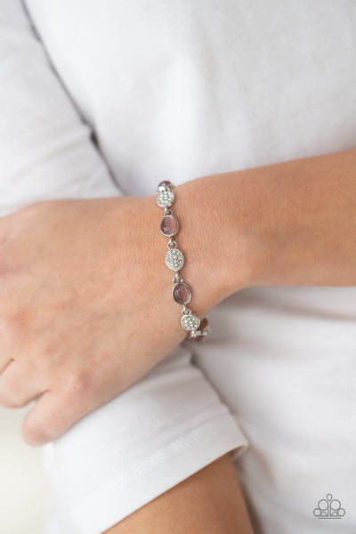 STOP AND GLOW - PURPLE CAT'S EYE WHITE RHINESTONE SILVER BRACELET - PAPARAZZI