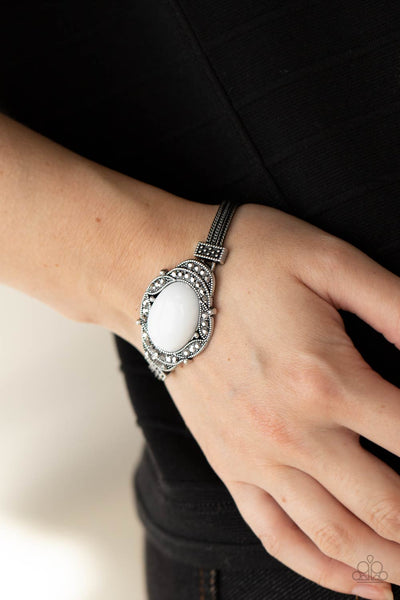 TOP-NOTCH DRAMA - WHITE OVAL BEAD HEMATITE RHINESTONE SILVER BRACELET - PAPARAZZI