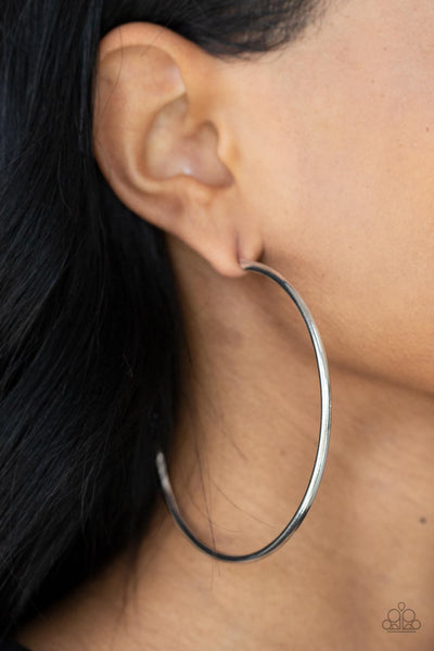 MEGA METRO - LARGE SILVER HOOP EARRINGS - PAPARAZZI