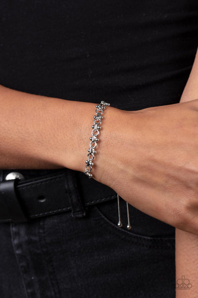 SLIDE ON OVER - SILVER LINK SLIDE BRACELET - PAPARAZZI
