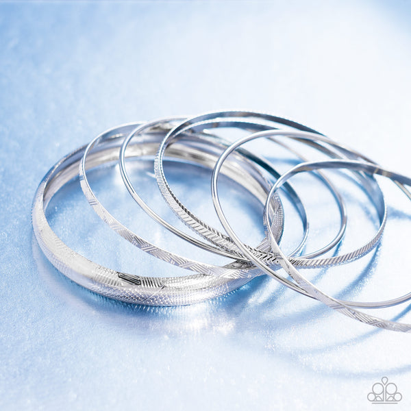 STACKABLE STUNNER - SILVER TEXTURED BANGLE BRACELET SET - PAPARAZZI