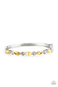 PETITELY POWERHOUSE - YELLOW RHINESTONE SILVER HINGED BRACELET - PAPARAZZI