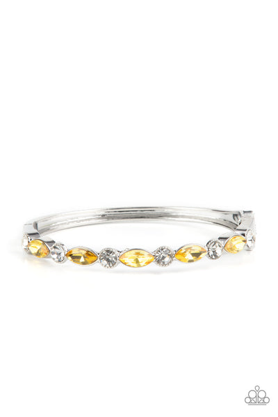 PETITELY POWERHOUSE - YELLOW RHINESTONE SILVER HINGED BRACELET - PAPARAZZI