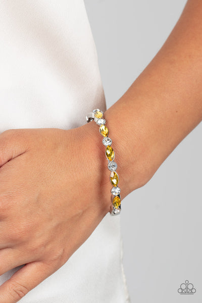 PETITELY POWERHOUSE - YELLOW RHINESTONE SILVER HINGED BRACELET - PAPARAZZI