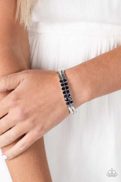 DOUBLED DOWN DAZZLE - BLUE RHINESTONE SILVER HINGED BRACELET - PAPARAZZI