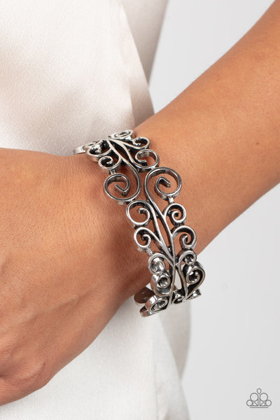 DRESSED TO FRILL - SILVER FLORAL FILIGREE HINGED BRACELET - PAPARAZZI
