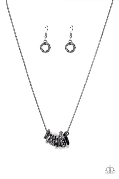 MECHANICAL MISCHIEF - BLACK GUNMETAL RINGS NECKLACE - PAPARAZZI