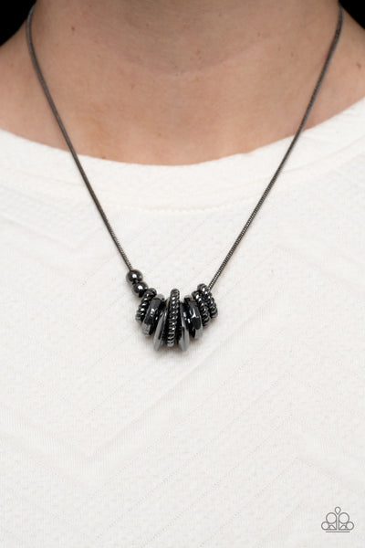 MECHANICAL MISCHIEF - BLACK GUNMETAL RINGS NECKLACE - PAPARAZZI