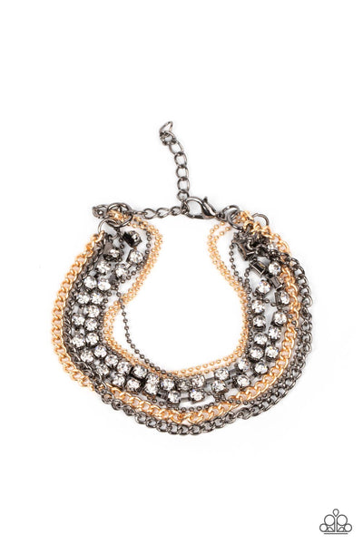 SECRETLY SASSY - MULTI GUNMETAL AND GOLD RHINESTONE BRACELET - PAPARAZZI