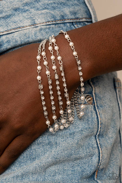 EXPERIENCED IN ELEGANCE - WHITE PEARL RHINESTONE SILVER CHAIN LAYERED BRACELET - PAPARAZZI