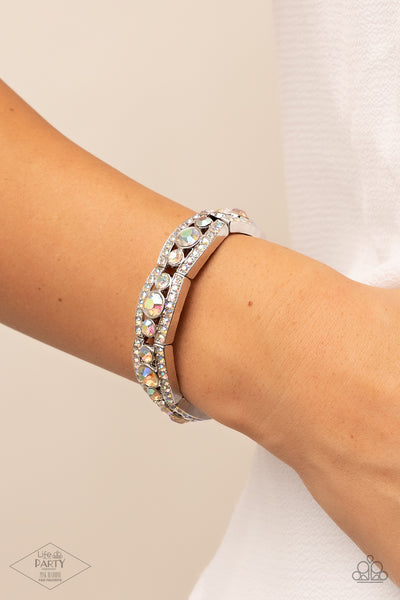 EASY ON THE ICE - MULTI IRIDESCENT RHINESTONE SILVER STRETCHY BRACELET - PAPARAZZI