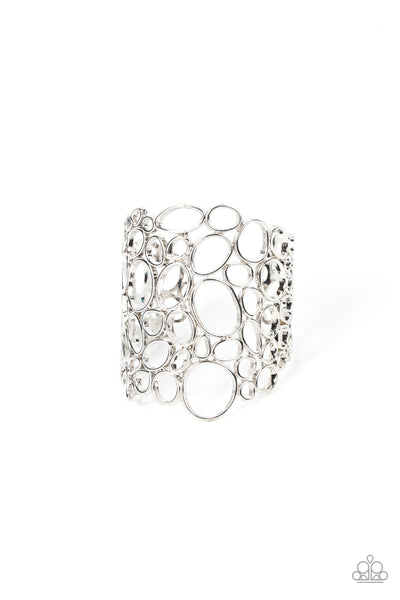 ALL TURNED AROUND - SILVER OVAL CUFF BRACELET - PAPARAZZI