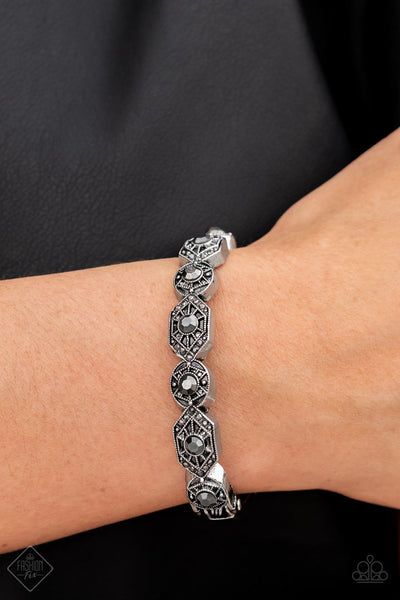 EYE-OPENING OPULENCE - SILVER HEMATITE RHINESTONE HINGED BRACELET - PAPARAZZI FASHION FIX AUGUST 2022