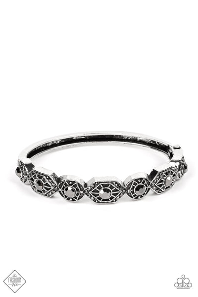 EYE-OPENING OPULENCE - SILVER HEMATITE RHINESTONE HINGED BRACELET - PAPARAZZI FASHION FIX AUGUST 2022