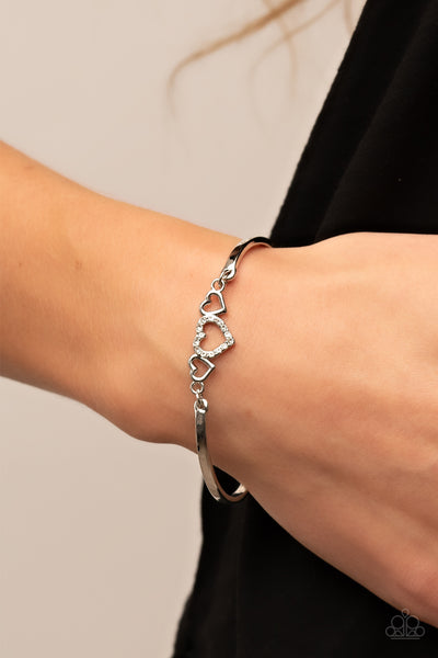 CUPIDS CONFESSIONS - WHITE RHINESTONE SILVER HEART BRACELET - PAPARAZZI