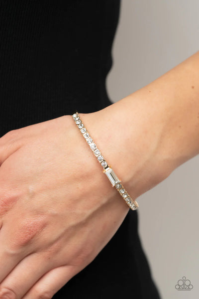 PARTY CRASHING COUTURE - GOLD WHITE RHINESTONE BANGLE BRACELET - PAPARAZZI