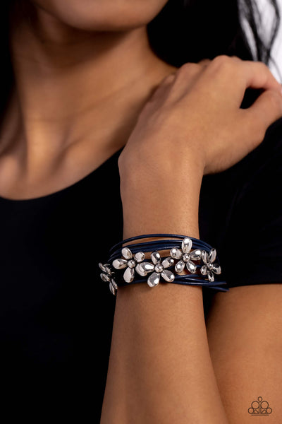 HERE COMES THE BLOOM - ORANGE LEATHER SILVER FLOWER MAGNET BRACELET - PAPARAZZI