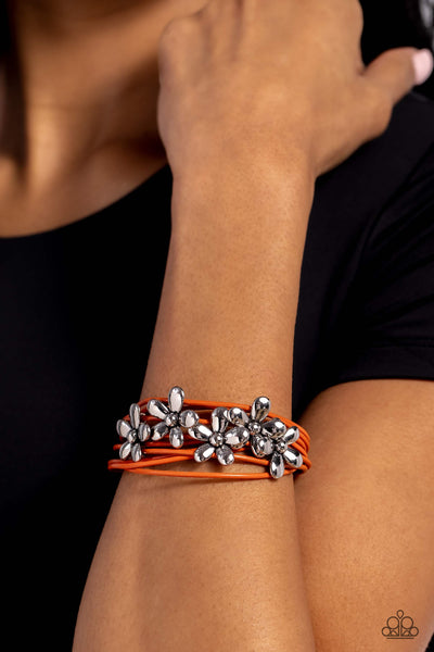HERE COMES THE BLOOM - ORANGE LEATHER SILVER FLOWER MAGNET BRACELET - PAPARAZZI