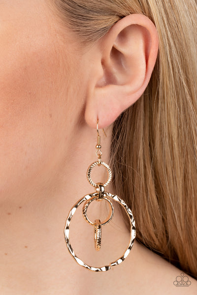 TWISTED TEMPTATION -GOLD WAVY CIRCLE EARRINGS- PAPARAZZI
