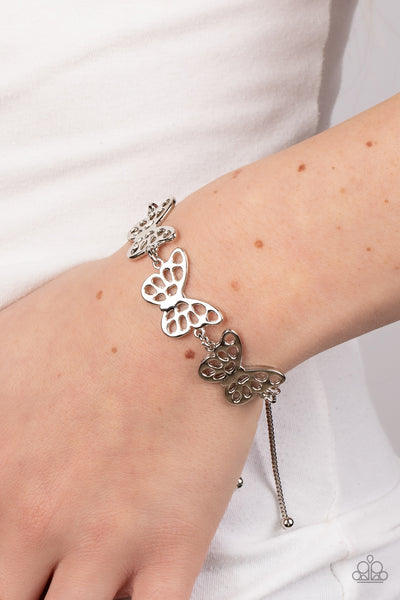 PUT A WING ON IT - SILVER BUTTERFLY SLIDE BRACELET - PAPARAZZI