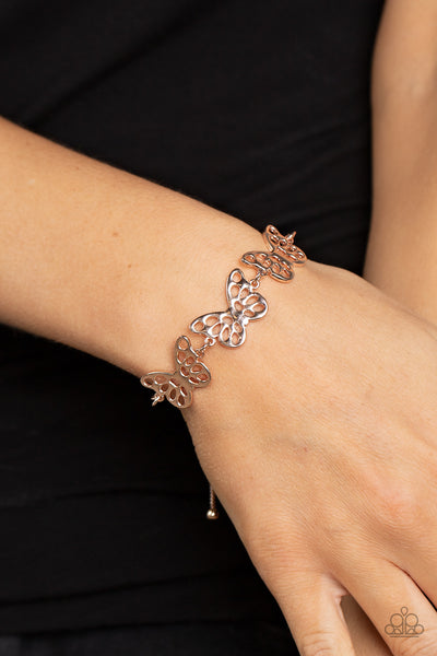 PUT A WING ON IT - ROSE GOLD BUTTERFLY SLIDE BRACELET - PAPARAZZI